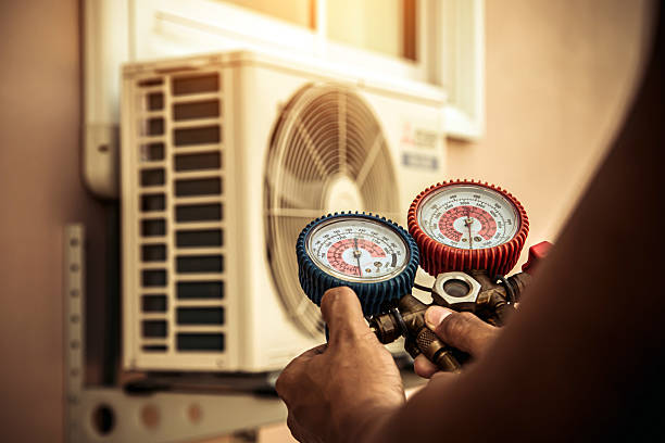 Professional Air Conditioning Service technician working in North Salt Lake, UT